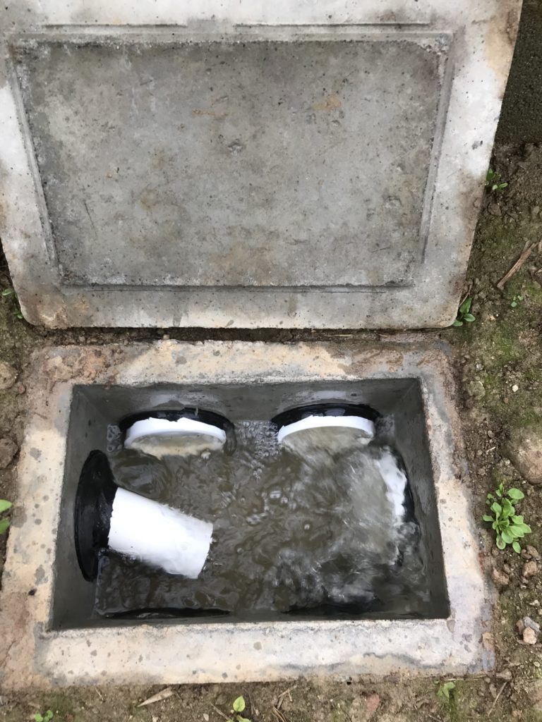 Rainwater fills septic tank